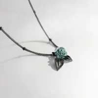 A lady's necklace with a rose