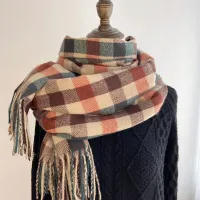 Female scarf for winter with plaid pattern and British style