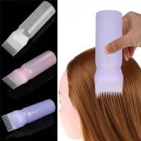 Bottle with hair dye comb