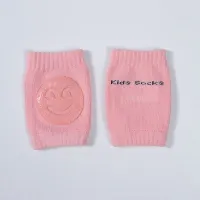 Baby knee pads with smiley face