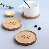 Wooden coaster with paw