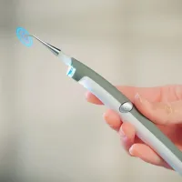 Ultrasonic tooth cleaning device