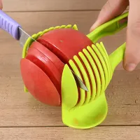 Hand-slicing fruit and vegetable, all in one