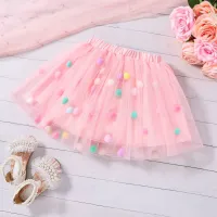 Girl's tutu skirt in tulle with colourful plush balls