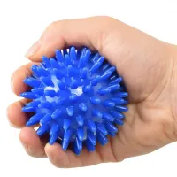 Massage ball with barbs for relief from muscle, joint and feet pain