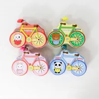 Children's tin cash box in a cute bicycle shape