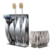 Self-adhesive toothbrush holder