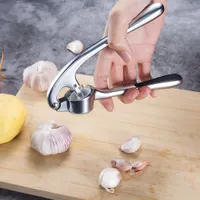 Premium garlic press with nut and seed crusher