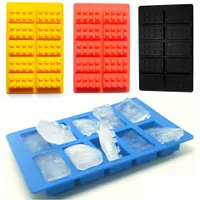 Modern silicone mould for making ice cubes in the shape of a building block - random colour
