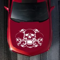 Sticker skulls on the hood of the car