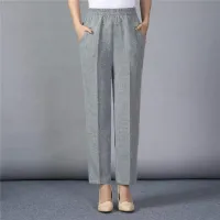 Elegant trousers for women in sizes L-4XL, made of cotton, loose and with elastic waist