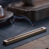 Wooden holder for incense sticks