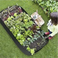 Layer raised garden bed