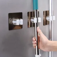 Self-adhesive hooks on the wall