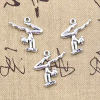 25 ks přívěsků ve tvaru gymnastek - vhodné pro tvorbu vlastních šperků, stříbrná barva