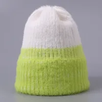 Unisex cap for women on winter, with fashionable single color design and knitting