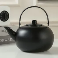 Stainless steel tea kettle with dispenser