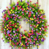 Luxury artificial realistic looking door wreath made of small flowers Shyam