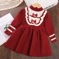 Girl sweater dress with round neckline, long sleeve and bows