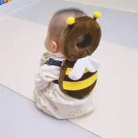 Backpack with child's head protector