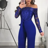 Tuta elegante da donna con pizzo blu reale