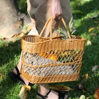 Spacious rustic picnic basket made of willow wicker with fixed ears