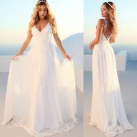 Beautiful white lace wedding dress with deep neckline