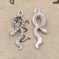 15 pcs of snake-shaped pendants in the color of old silver (34x11 mm) for the production of jewelry and DIY creation