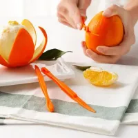 Two original longer orange peelers - easy peeling, which will take you a minimum of time