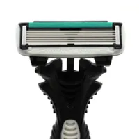 Shaving machine with stainless steel head