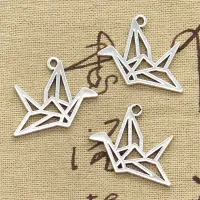 15 pieces Tibetan silver pendants with origami cranes 23x29 mm in antique silver design