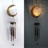 Solar power of moonlight wind chimes Metal casting shadows LED light