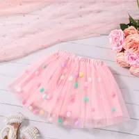 Children's tulle skirt for everyday wearing with colored polka dots