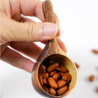 Wooden measuring cup