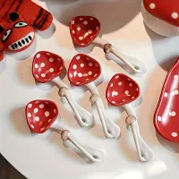 Cute cartoon spoons in the form of red toads made of quality ceramics