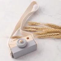 Wooden camera with strap