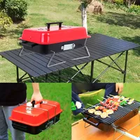 Portable Grill On Wooden Coal For Outdoor Camping