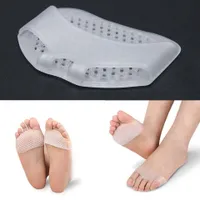 Gel pads under the arch of the foot