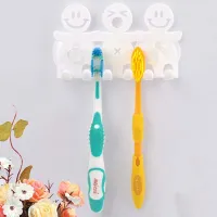 Wall bracket for toothbrushes