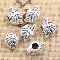 10 pcs of large hole beads with leaves of trees in antique silver color for jewelry production