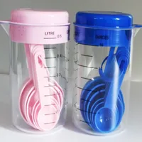 Plastic measuring cup 500 ml with measuring spoons