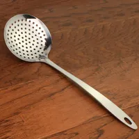 Stainless steel ladle with holes