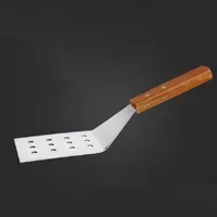 Spatule en acier inoxydable avec trous