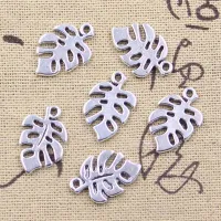 30 pcs pendants with hollow feather in antique silver design 19x12 mm