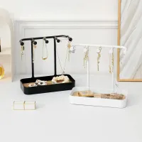 Jewelry with wooden base and earring rack, necklaces, bracelets and rings