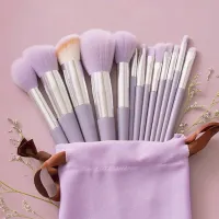 Set of fine and fluffy cosmetic brushes for applying make-up, powder, lipstick and shadows