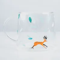 Glass mug with animals