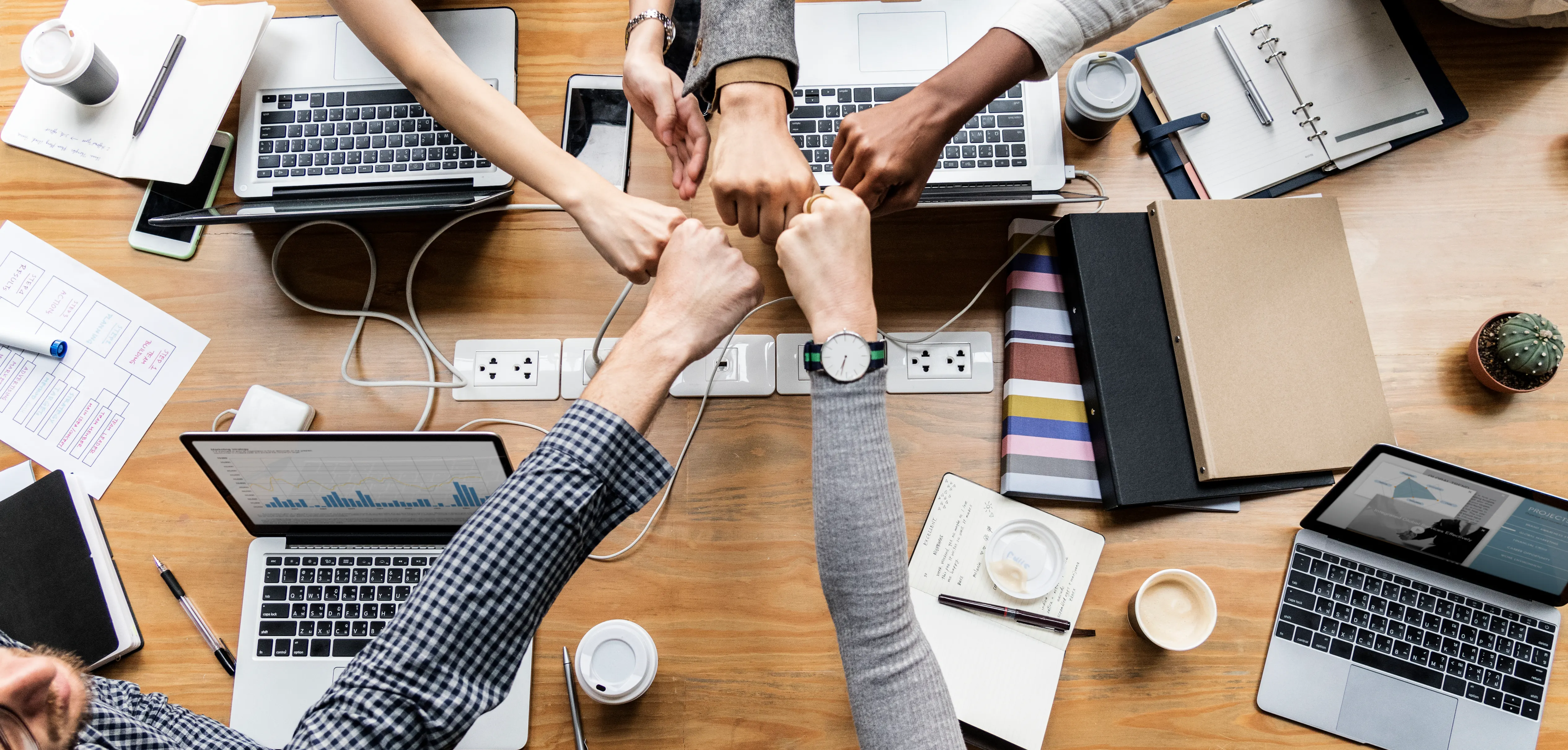 colleagues-giving-fist-bump.jpg